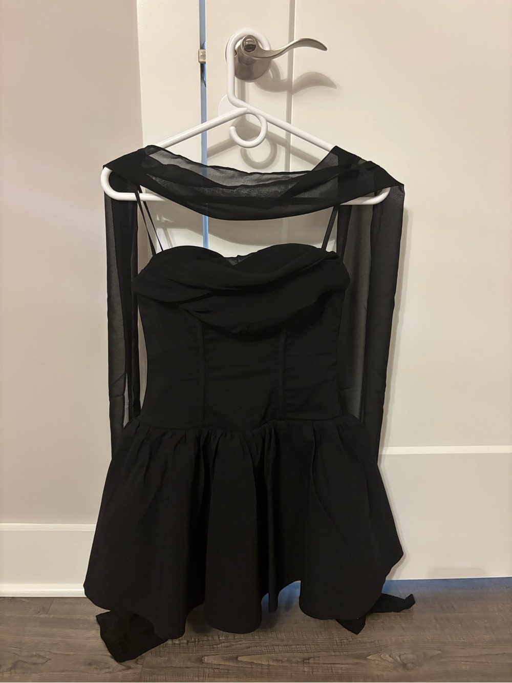 Elegant Black Strapless Fit-and-Flare Dress with Sheer Wrap